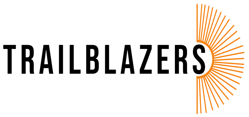 The Trailblazers logo written in a bold black font with an orange fan.