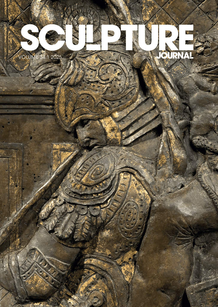 Journal cover for 'Sculpture Journal' The title of the journal sits at the top in a bright white modern font. The cover image is a bronze tone with hints of gilding and depicts the following: 

Detail of sleeping soldier on 
the panel of the Resurrection, 
from Donatello’s Pulpit of 
the Resurrection, after 1460, 
during cleaning in 2013. 
Basilica of San Lorenzo, 
Florence (photo: OPD archive).