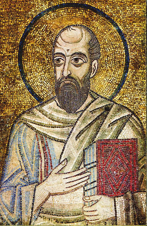 A golden mosaic of the apostle Paul, who is holding a book and wearing white robes.